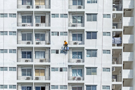 construction worker working on a high rise building in Hong Kong.