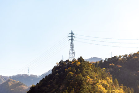 high voltage post.High-voltage tower on the mountain.の写真素材