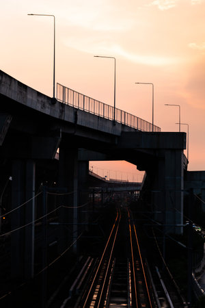 Railway bridge at sunset in bangkok thailand,selective focusの写真素材