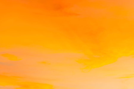 Beautiful orange sky with clouds at sunset background. Nature cloudscapeの写真素材