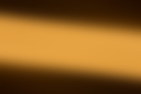 Gold metal texture background with some smooth lines in it. Abstract background.の写真素材