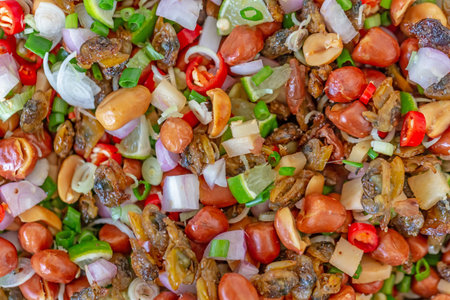 Thai spicy salad with salted fish, chili, onion and pepper