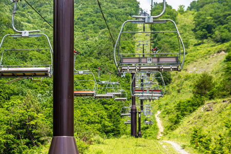 Gondola lift in the mountains at summer, Sochi, Russiaの写真素材