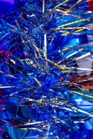 Close up of a blue christmas tinsel as a background.の写真素材