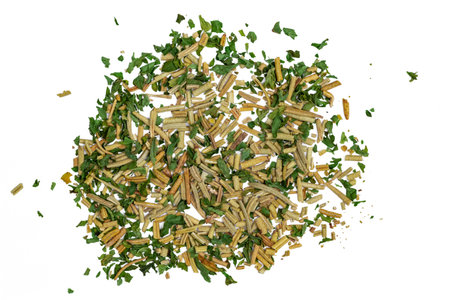 Pile of chopped green parsley isolated on white background. Top view.の写真素材