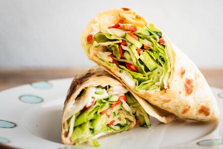 Vegan / vegetarian wrap with fresh vegetables