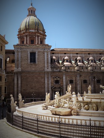 Part of the fountain of Piazza Pretoria in Palermo with the church of San Giuseppe dei Teatini. Sicily Italy.のeditorial素材