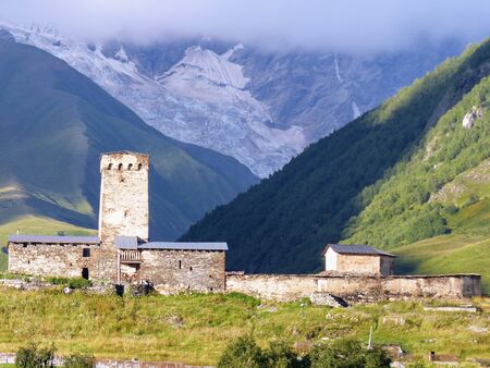 Lamaria Orthodox Church at the foot of a Glacier of Usghuli in Georgia.のeditorial素材