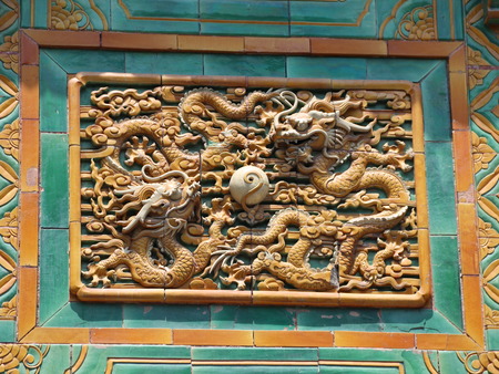 Dragons with pearl wall carving sculptureの写真素材