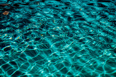 Turquoise water in the pool as a background. Texture.の素材