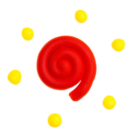 Sun modelling clay isolated on whiteの写真素材