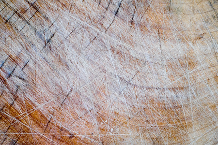 Grungy old wooden cutting boardの写真素材