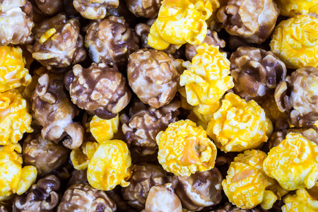 Texture of mixed cheese and caramel popcornの写真素材