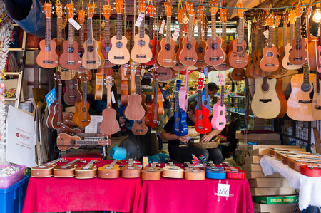 BANGKOK, THAILAND - CIRCA JULY, 2015: Ukulele for sale at Chatuchak weekend market. It is one of the largest market in Asia.のeditorial素材