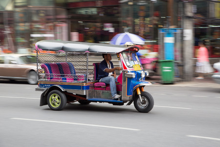 BANGKOK, THAILAND - CIRCA JULY, 2015: Unidentified tuk tuk driver speeding in China town, Bangkok.のeditorial素材