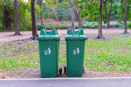 Green trash bin from a public park, Thailandの写真素材