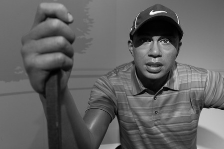 BANGKOK, THAILAND - CIRCA August, 2015: Wax figure of the famous Tiger Woods from Madame Tussauds, Siam Discovery, Bangkokのeditorial素材