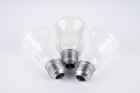 Close up on incandescent light bulb isolatedの写真素材