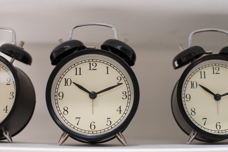 Close up on clock hanging on the wall