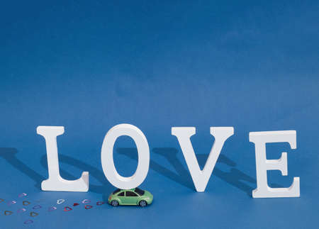 car caring love on a blue backgroundの写真素材