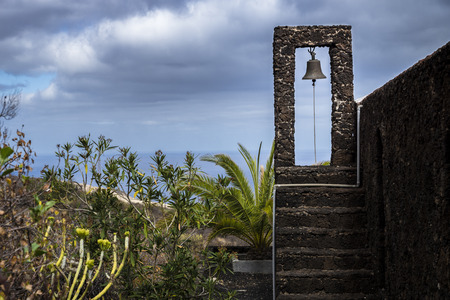 Bell tower of a church in El Golfo Valley El Hierro, Canary Island, Spainの写真素材