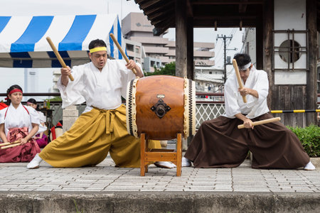 Tokyo, Japan - September 24 2017: Drummers with drum and sticks playing in traditional clothing at Shinagawa Shukuba Matsuri festivalのeditorial素材