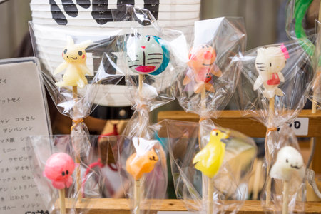Tokyo, Japan - September 24 2017: Manga characters as lollypops on a stick at a stallのeditorial素材