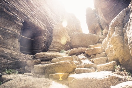 Cave trenches at stone path in sandstone of Japanese army left from Pacific war at Yongmeori Beach,...