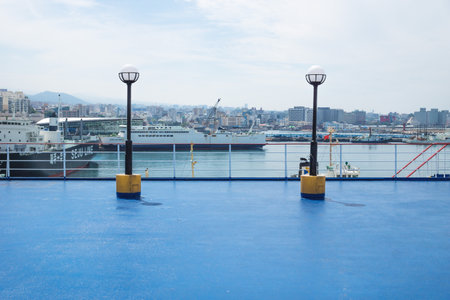 Jeju-si, Jeju Island, South Korea - August 31 2017: View from ferry deck to harbor and city at...