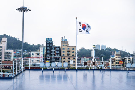 Mokpo, South Korea - August 31 2017: View from deck of ferry with South Korean flag to cityのeditorial素材