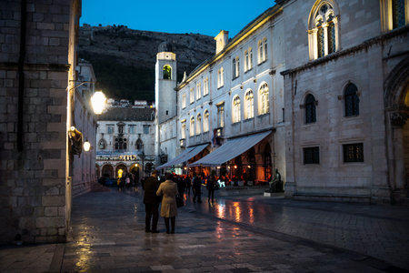 Dubrovnik, Croatia - December 31 2015: Night scene along museum and Palaca Grada in Dubrovnik at New Years Eve with cristmas decoration, Croatiaのeditorial素材