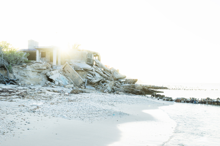 Abandoned house during sunset at the beach in Chelem, Mexicoの写真素材