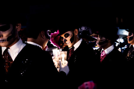 Merida, Mexico - October 27 2018: Dancers waiting for the parade and lightening candels for Dias de...