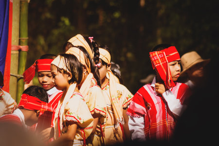 Bilu Kyun, Ogre Island, Mon State, Myanmar - 12 January 2013: Children in traditional burmese dresses preparing for performance on a new year celebrationのeditorial素材