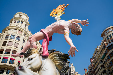 Valencia, Spain - September 4, 2021: Fallas figurine of falling men striked by lightening on 'Placa de la Reina' designed by Latorre and Sanz Artesanos SL.のeditorial素材