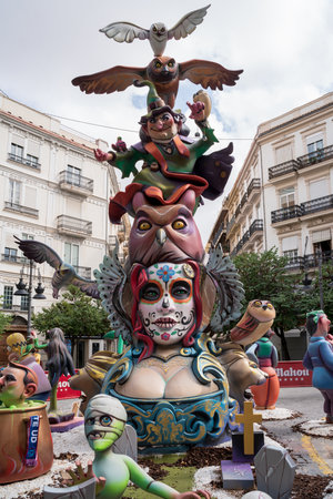 Valencia, Spain - September 4, 2021: Paper mache figurines of witches, catrina and owls for the...
