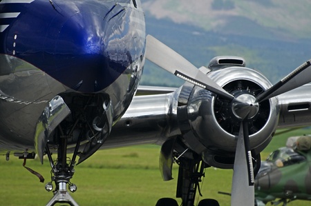 high tatras,slovakia-june 2011:red bull dc-6b -  high mountains of the tatra mountains in slovakia during the air show 25th 26th june 2011 at the airport in poprad, slovakia june 2011のeditorial素材