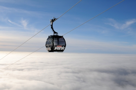 Jasna, Slovakia, Januar 2013:Modern cabin cable car in Slovak ski resort above the clouds clearのeditorial素材