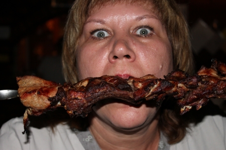 Girl eats kebabの写真素材