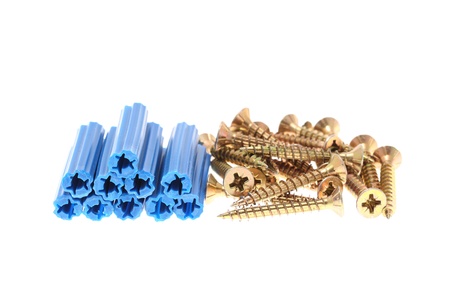 details of blue dowels and golden screws isolated  on whiteの写真素材