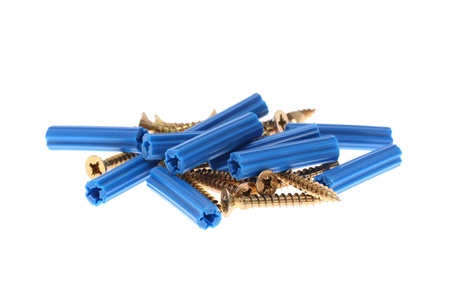 details of blue dowels and golden screws isolated  on whiteの写真素材
