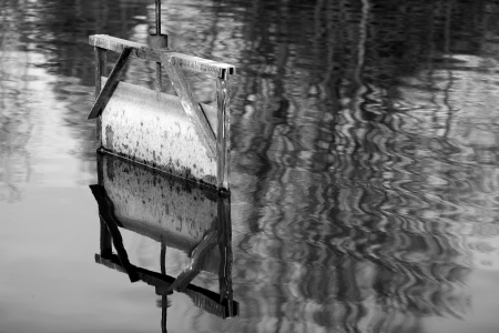 Details of a sluice of a pond in in Dombes in the department of Ain in France.の写真素材