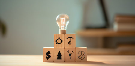 Hand of male putting wood cube block with word BRAND on wooden table. Brand building for success conの素材
