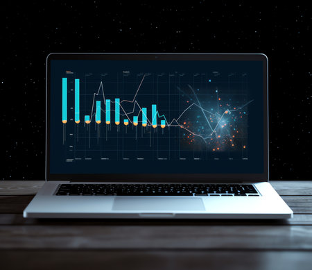 technology and advertisement concept - laptop computer with graph on screenの素材