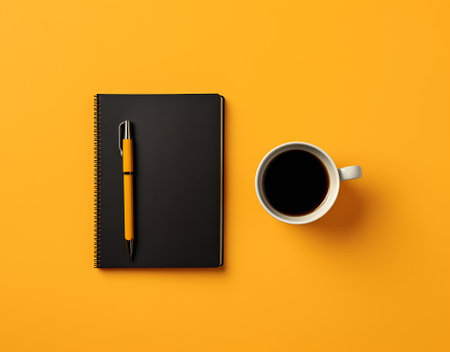 Flat lay or top view of black pen with calculator on vivid yellow background table with blank copy sの素材