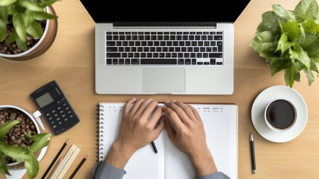 Grow your business words on office table with computer, coffee, notepad, smartphone and digital tablの素材