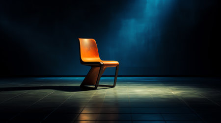 Empty chair on a dark background with a spot of light on the stage, recruiting, searching, vacancy,の素材