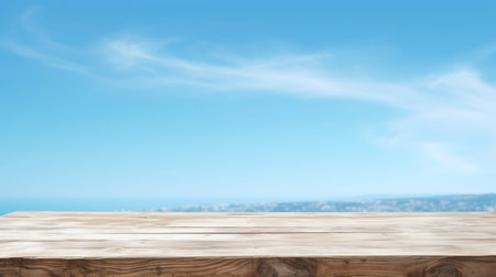 Empty wooden table on rice fields with blue sky backgroundの素材