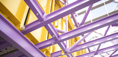 Yellow metal support beams, single side bracket on external wall. Construction site. Brussels, Belgiumの素材