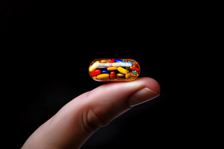 Generative AI : Colorful pills and medicines in the handの素材